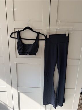 Strut this Black Yoga Sports Bra and Flared Leggings Set